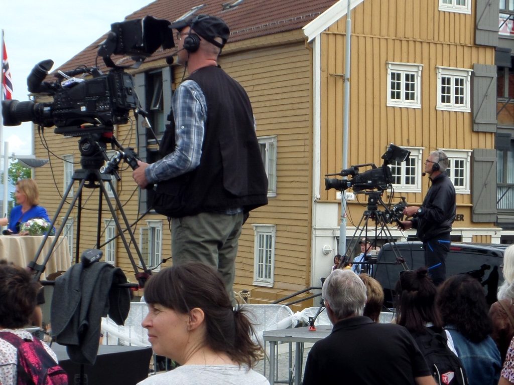 Tv cameramen covering the King's visit